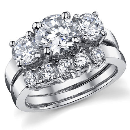 2.5ct (7.5mm,5mm) Round Brilliant Moissanite Three Stone Ring