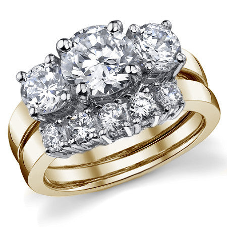 2.5ct (7.5mm,5mm) Round Brilliant Moissanite Three Stone Ring