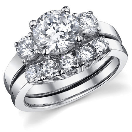 2.2ct (7.5mm,4.5mm) Round Brilliant Moissanite Three Stone Ring