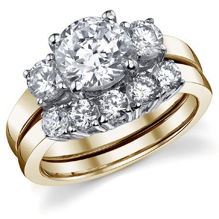 2.2ct (7.5mm,4.5mm) Round Brilliant Moissanite Three Stone Ring