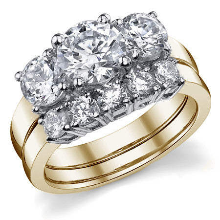 2.25ct (7mm,5mm) Round Brilliant Moissanite Three Stone Ring