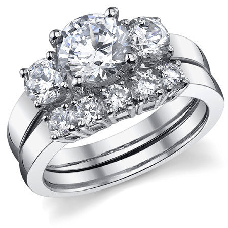 1.9ct (7mm,4.5mm) Round Brilliant Moissanite Three Stone Ring