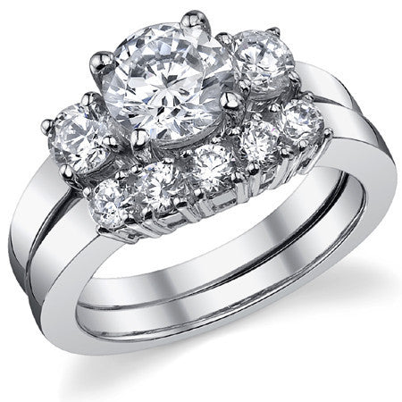 1.75ct (7mm,4mm) Round Brilliant Moissanite Three Stone Ring