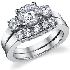 1.75ct (7mm,4mm) Round Brilliant Moissanite Three Stone Ring
