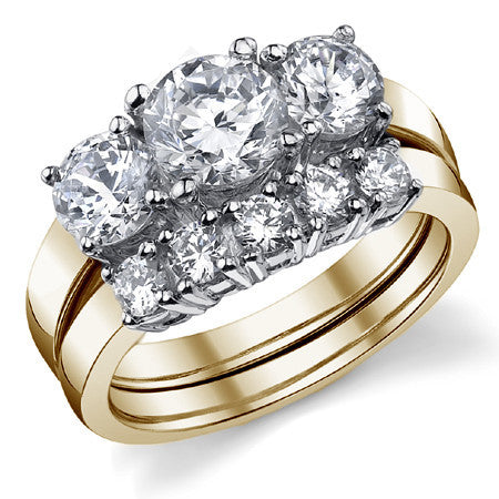 2.0ct (6.5mm,5mm) Round Brilliant Moissanite Three Stone Ring