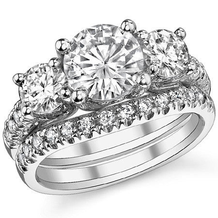 3.2ct (8mm/5mm) Round Brilliant Moissanite Trellis Three-Stone Ring
