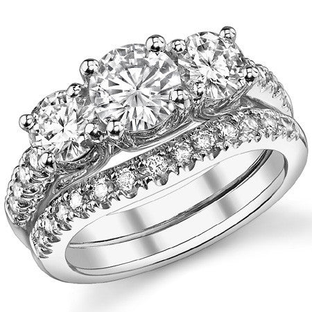 2.2ct (6.5mm/5mm) Round Brilliant Moissanite Trellis Three-Stone Ring