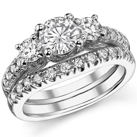 1.7ct (6.5mm/4mm) Round Brilliant Moissanite Trellis Three-Stone Ring