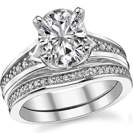 Round Brilliant Moissanite & Diamond Engagement Ring (0.10ct)