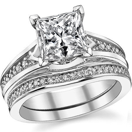 Round Brilliant Moissanite & Diamond Engagement Ring (0.10ct)