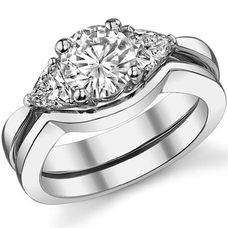 1.25ct (6mm/4mm) Round & Trillion Moissanite Three Stone Ring