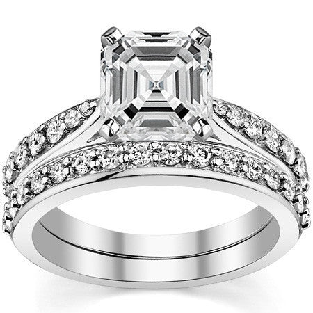 Round Brilliant Moissanite Tapered Cathedral Engagement Ring