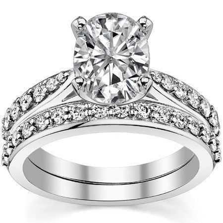 Round Brilliant Moissanite Tapered Cathedral Engagement Ring