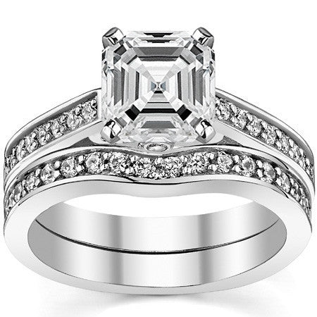 Round Brilliant Moissanite Scroll Cathedral Engagement Ring