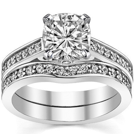 Round Brilliant Moissanite Scroll Cathedral Engagement Ring