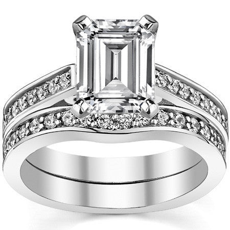 Round Brilliant Moissanite Scroll Cathedral Engagement Ring