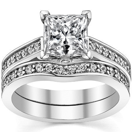 Round Brilliant Moissanite Scroll Cathedral Engagement Ring