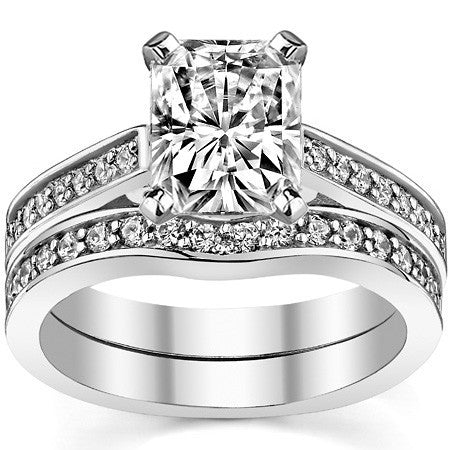 Round Brilliant Moissanite Scroll Cathedral Engagement Ring