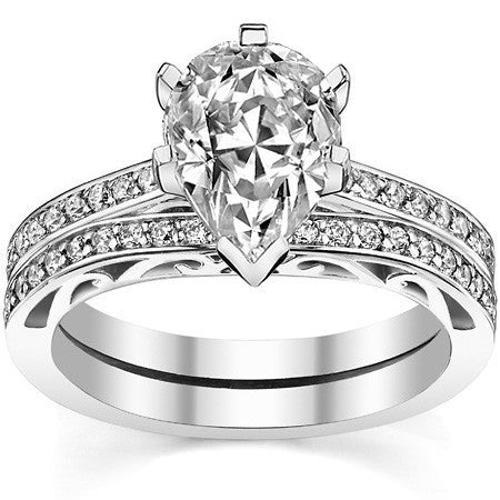 Round Brilliant Moissanite Scroll Engagement Ring