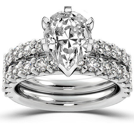 Round Brilliant Moissanite Shared-Prong Semi-Eternity Ring (0.72ct)