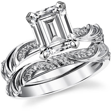 Round Brilliant Moissanite Floral Accent Engagement Ring