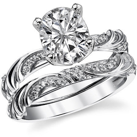 Round Brilliant Moissanite Floral Accent Engagement Ring