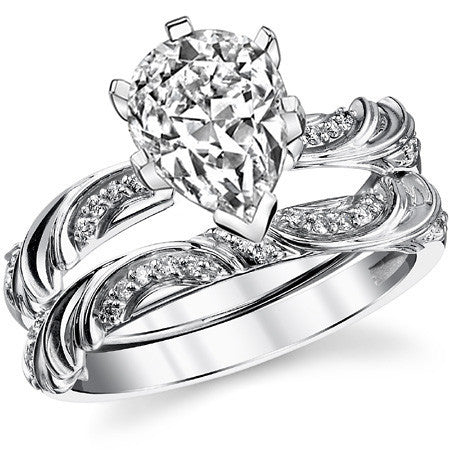 Round Brilliant Moissanite Floral Accent Engagement Ring